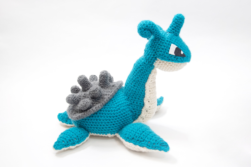Crocheted Lapras pokemon. Side view.