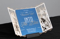 Artist: Katelynn Phelan x folded paper invitation. Intricate trifold paper invitation with aquatic cutout elements. Graphic Design.