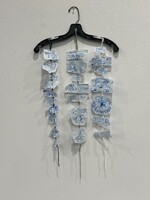 Artist: Emma Drumright. 17x35” mixed media titled Three nights, two dreams. 
