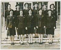 Women in uniforms in a group of two rows of five.