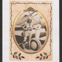 A photo of a woman standing next to an airplane in a gold frame.