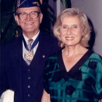 Photograph of Dr. Garcia and his wife Wanda with Dr. Garcia's Medal of Freedom.