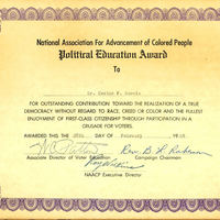Photograph of Dr. Garcia's Political Education Award from NAACP.