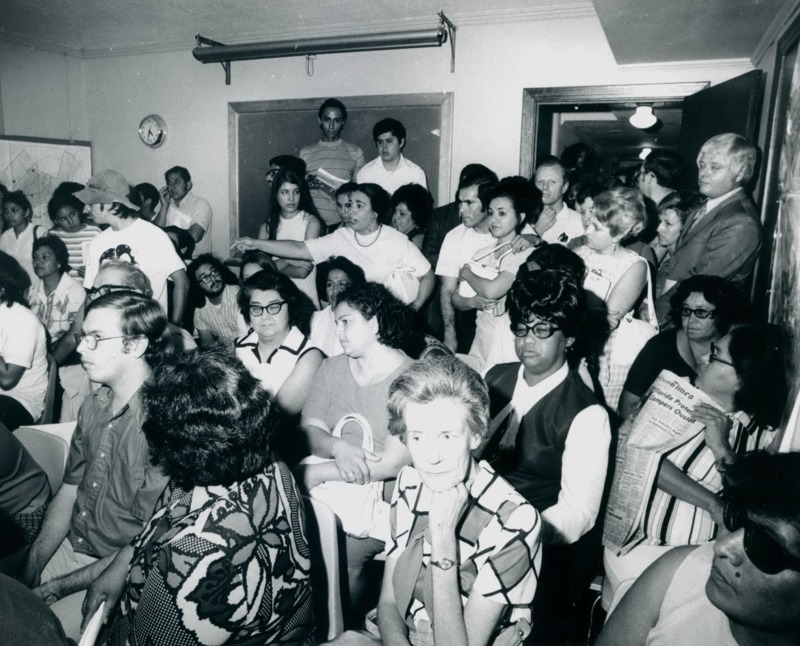 Photograph of a large group of students and parents participating in a school segregation protest led by Dr. Garcia. 