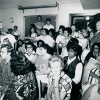 Photograph of a large group of students and parents participating in a school segregation protest led by Dr. Garcia. 