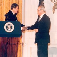 Photograph of Dr. Garcia receiving his Presidential Medal of Freedom from President Reagan. 