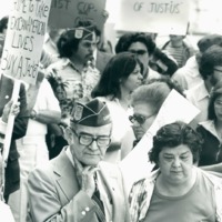 Photograph of Dr. Garcia and his sister Clotilde at a protest for the murder of Jose Campos Torres. 